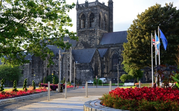 Facade of the Paisley Abbey parish church in Paisley, Scotland A facade of the Paisley Abbey parish church in Paisley, Scotland