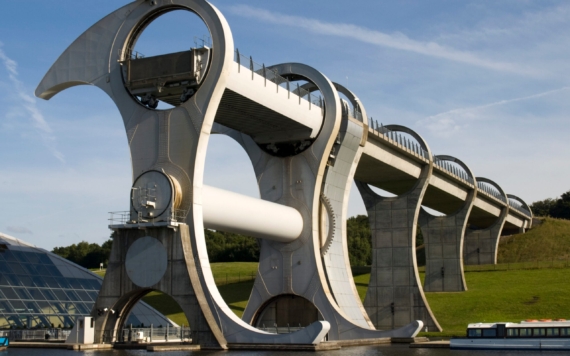 The Falkirk Wheel located in Falkirk, Scotland The Falkirk Wheel, named after the nearby town of Falkirk in Central Scotland, is a rotating boat lift connecting the Forth and Clyde Canal with the Union Canal. The two canals were previously connected by a series of 11 locks, but by the 1930s these had fallen into disuse, were filled in and the land built upon.